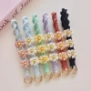 Spring/Summer 2026 new collection: Pure hand-woven mobile phone chain, small Daisy flower wrist lanyder, keychain, bag pendant Application Scenario